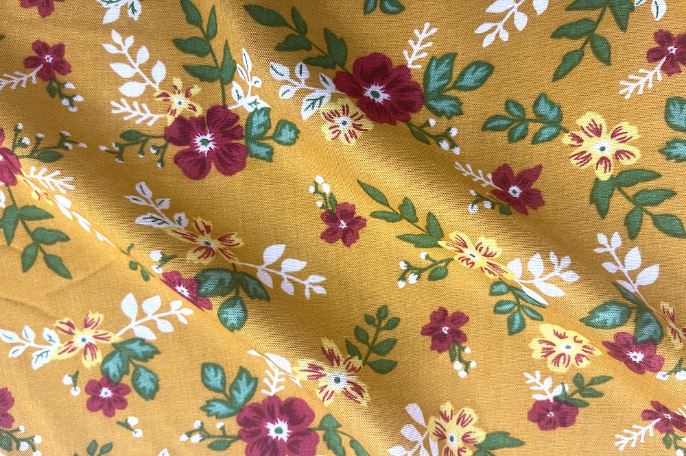Rayon Challis Burnt Orange with Yellow and red Flowers