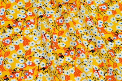 Rayon challis yellow and white floral print