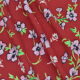 rayon challis with pink flowers on a red background