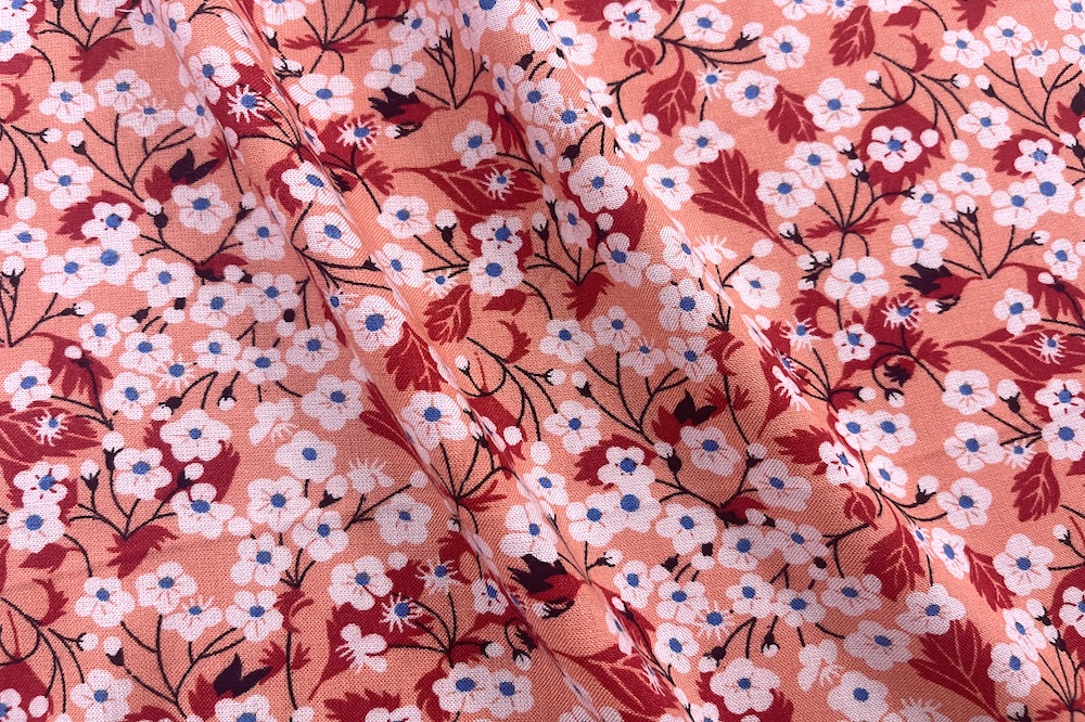 Rayon Challis Orange with White and Blue Flowers