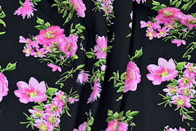 rayon challis with pink flowers on a black background