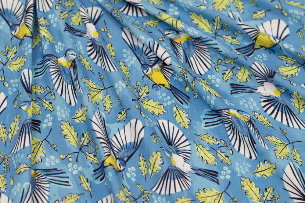 Marketa Stengl by Fabric Merchants Double Brushed Poly Jersey Knit Flying Birds and Oak Leaves Blue/Yellow