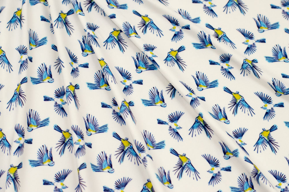 Marketa Stengl by Fabric Merchants Double Brushed Poly Jersey Knit Flying Small Blue Bird White/Blue