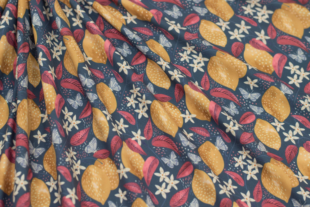 Marketa Stengl by Fabric Merchants Double Brushed Poly Jersey Knit Lemons Pattern with Flowers and Butterflies Blue/Gold