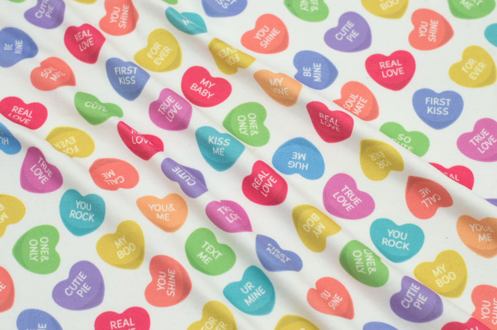“Playful Prints by Fabric Merchants” Double Brushed Candy Hearts White/Pink/Green