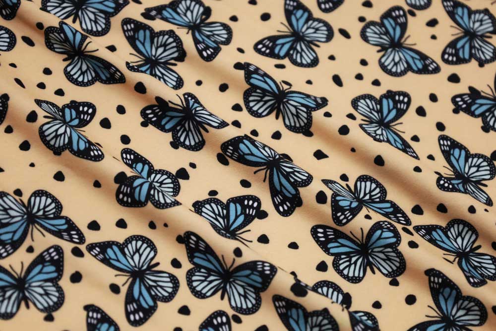 Double Brushed Butterflies On Spots Light Peach/Turquoise